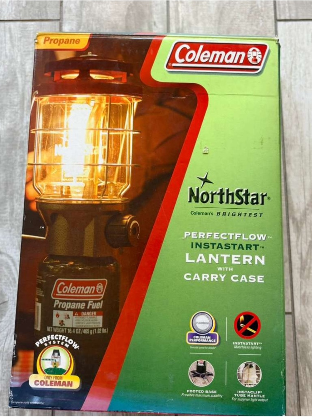Coleman packaging with red box and white barcode label